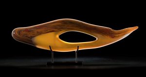 Caladesi shown in cinnamon color is a hand blown glass sculpture created by Bernard Katz