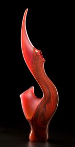 Grand Serenoa in red color by Bernard Katz Glass Grand Serenoa shown in red is a hand blown glass sculpture created by Bernard Katz