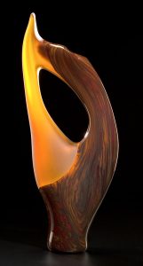 Vilano in cinnamon color by Bernard Katz Glass Vilano shown in cinnamon is a hand blown glass sculpture created by Bernard Katz