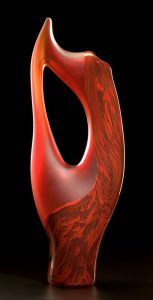 Vilano in red color by Bernard Katz Glass Vilano shown in red color is a hand blown art glass sculpture created by Bernard Katz
