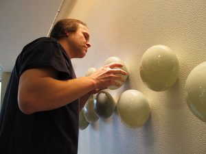 glass wall sculpture installation bernard katz closeUp grey form