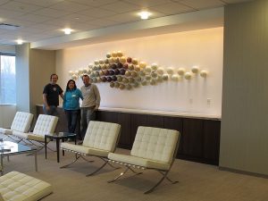 glass wall sculpture installation bernard katz, katie, chad