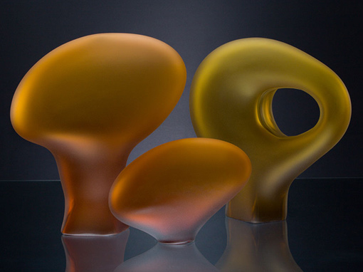 Melange Series 1 art glass sculpture in sunset salmon and amber color by Bernard Katz