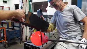 Glass Blowing – necking hot glass with jacks
