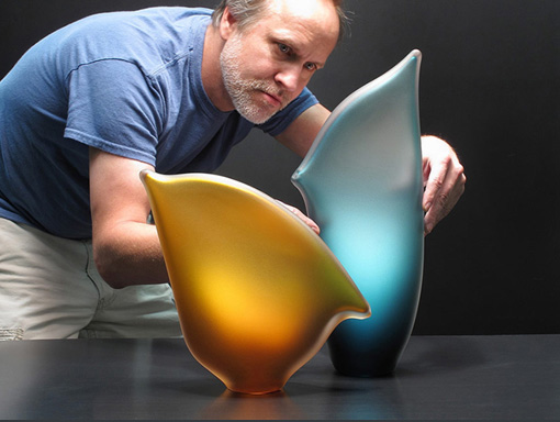 Bernard Katz adjusting Beach Horizon art glass sculpture from Melange Series